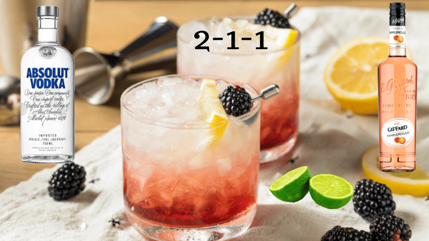 Blackberry Bramble cocktail on table - brigzen
